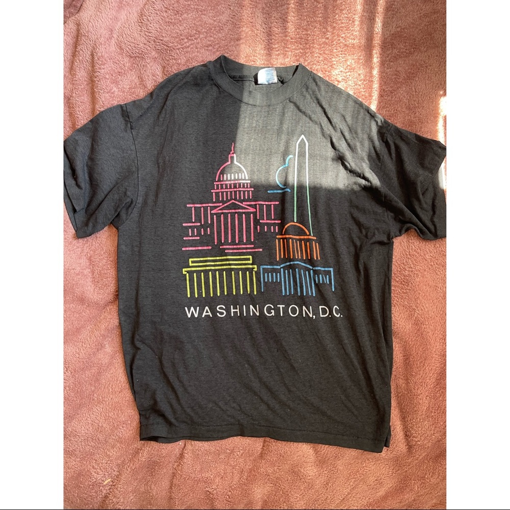 Black shirt with colorful print.